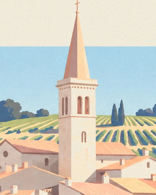 The bell tower with its ochre spire above the tiled rooftops, in front of the rows of vines