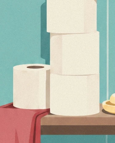 Les rouleaux de papier toilette sur une étagère, près d’un tissu rouge