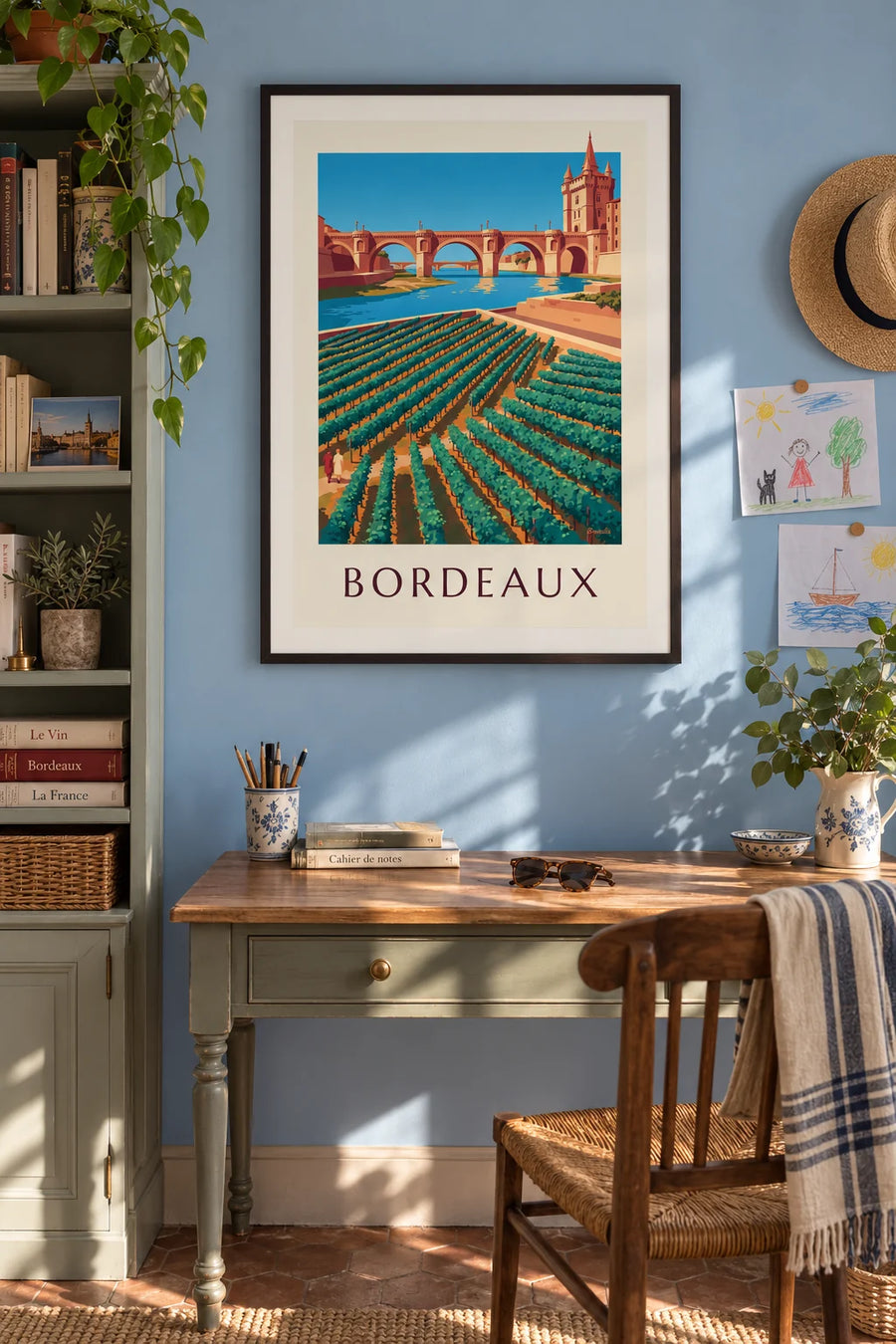 Stone bridge and Porte Cailhau in Bordeaux seen from the vineyards poster: framed on the wall