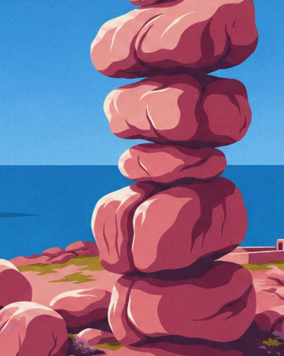 A stack of 5 large pink granite boulders facing the sea under a blue sky