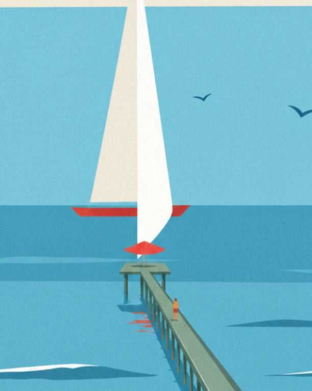 The red-hulled sailing boat offshore from the wooden pier beneath 2 seagulls