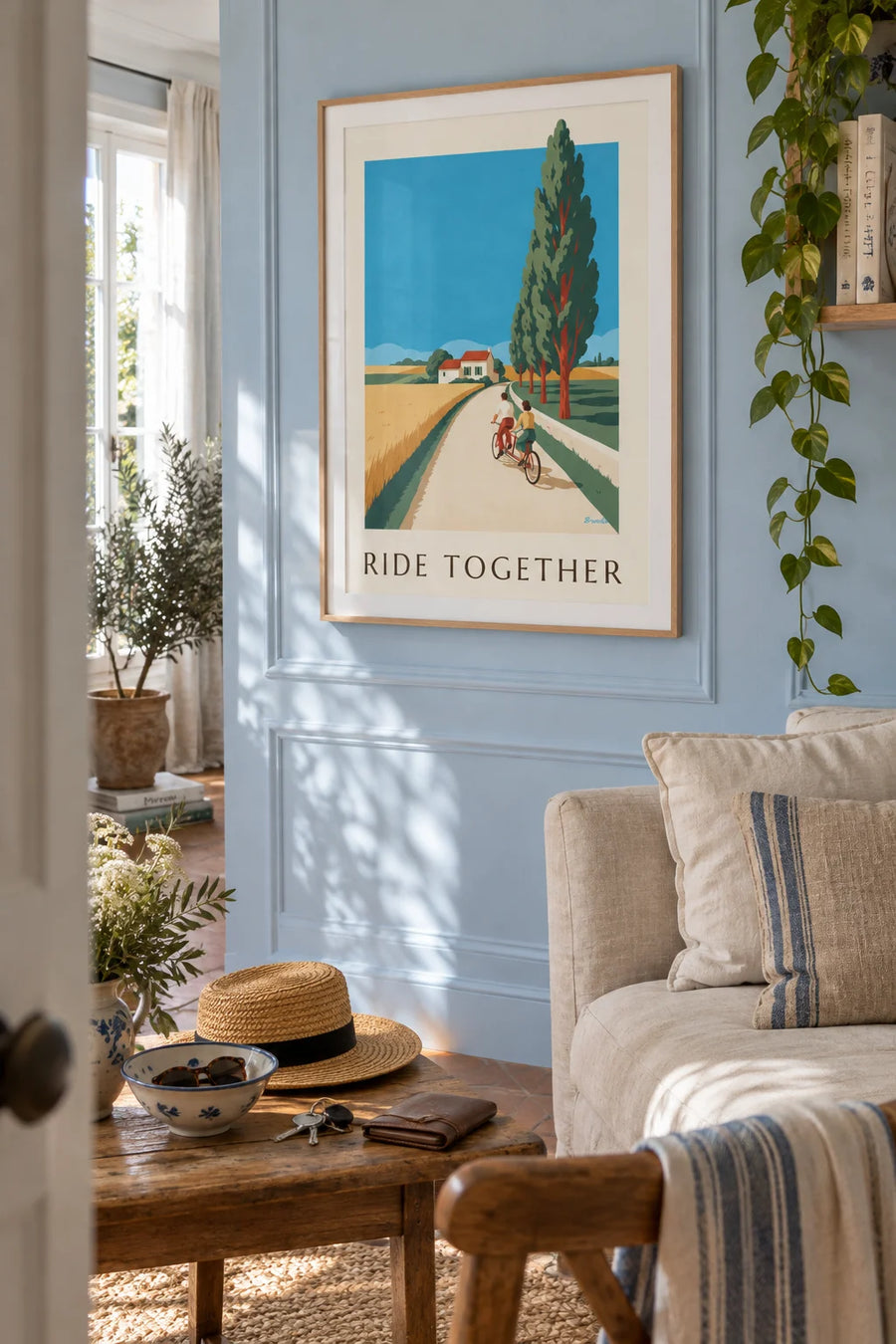 Poster of a couple on a tandem bike on a country road: framed on the wall