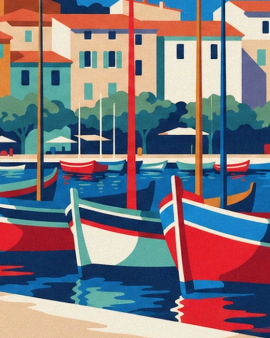 Red, blue and sea-green traditional fishing boats in front of the pale façades of Sanary harbour