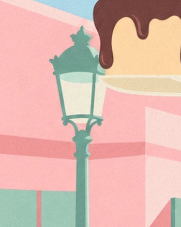 The green street lamp in front of the pink façade, beside the chocolate-covered cake