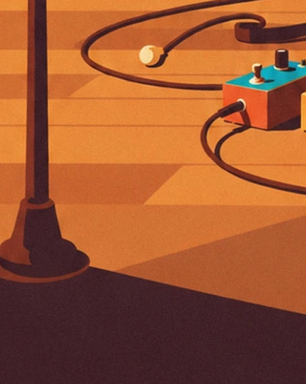 The orange and turquoise effects pedal, its black cables and the microphone stand on the floor