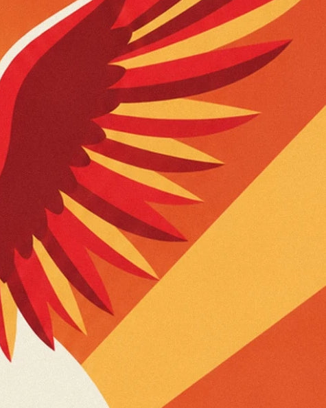 The red feathers fanned out over yellow and orange stripes