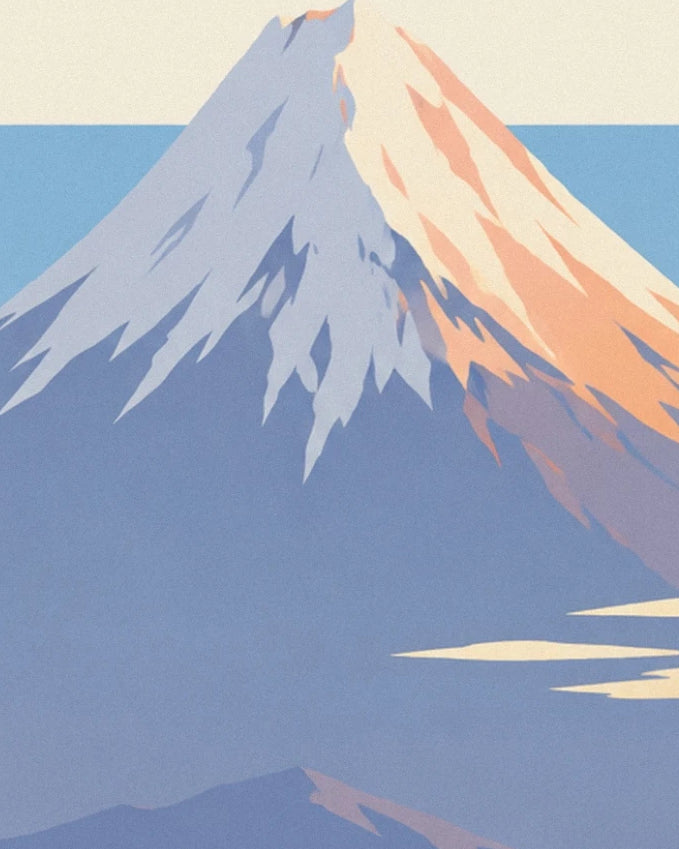 The snow-covered slopes of mont Fuji, with blue-tinted shadows and pink light