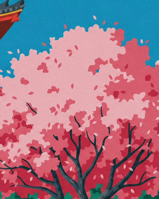 La ramure du cerisier chargée de fleurs rose pâle et soutenu sur le ciel bleu
