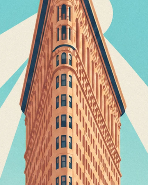 The pointed corner of the Flatiron Building in pinkish stone, seen from below against a turquoise sky