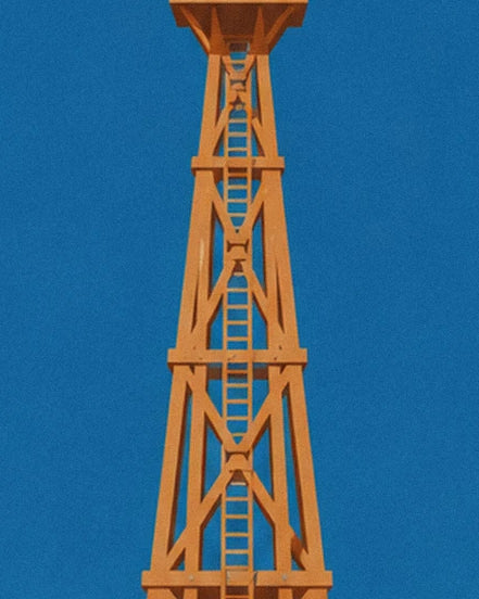 Orange wooden refuge beacon with its ladder and cross braces against a blue sky