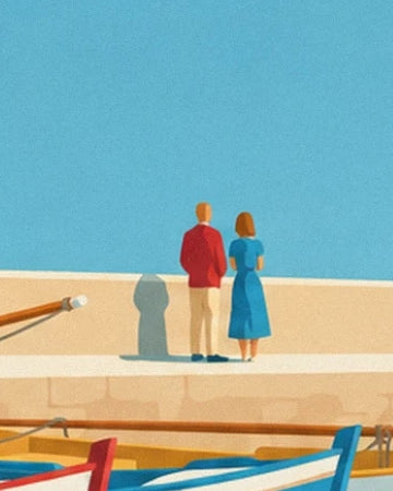 A couple in a red jacket and a blue dress on the quay in front of the pinasse boats