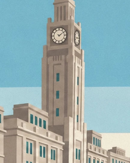 The tower with 2 clock faces and beige façades beneath the blue sky