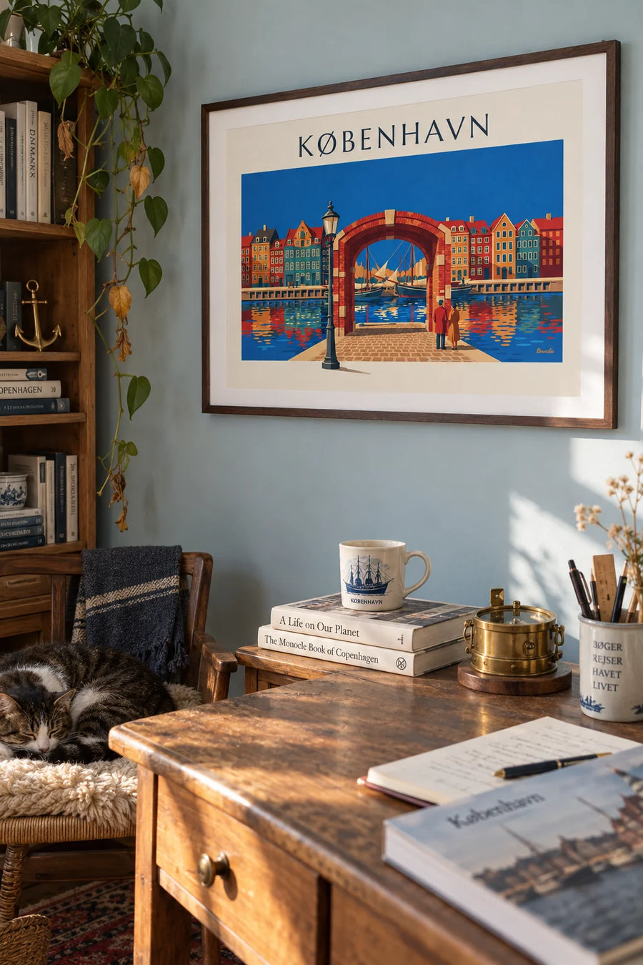 Poster of the colorful houses and old sailboats of Nyhavn in Copenhagen: framed on the wall