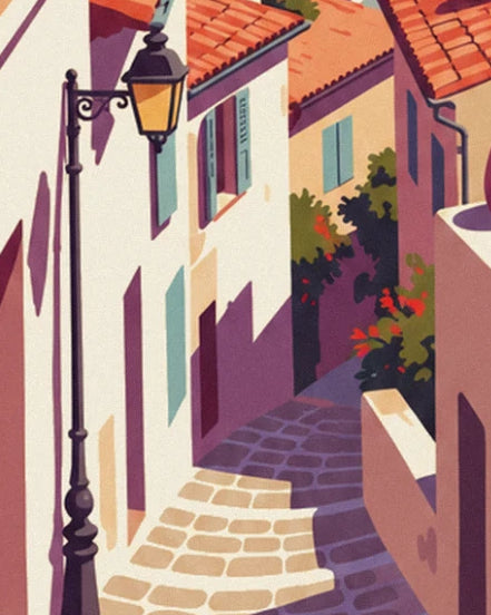 The stepped cobbled lane with its black street lamp and flower-covered white façades