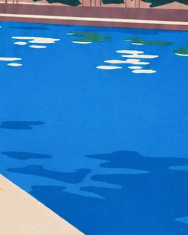 The bright blue water of the Seine, its white reflections and broad blue shadows