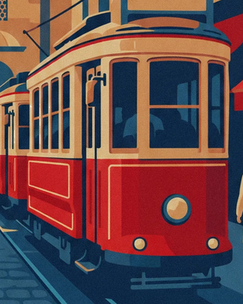 The red and cream tram with large windows and a round headlight on avenue İstiklal
