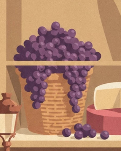 Les grappes de raisin violet débordant du panier, près du fromage sur sa boîte rouge