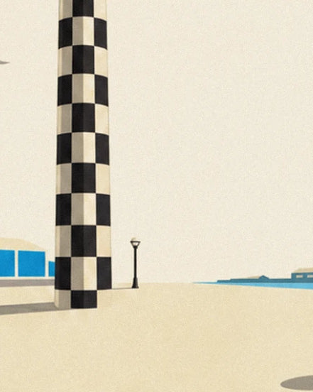 The black and cream chequered pylon, its street lamp and the blue sea in the distance