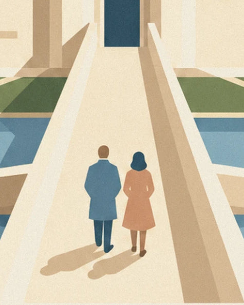 A couple seen from behind, in blue and pink coats, on the footbridge over the moat