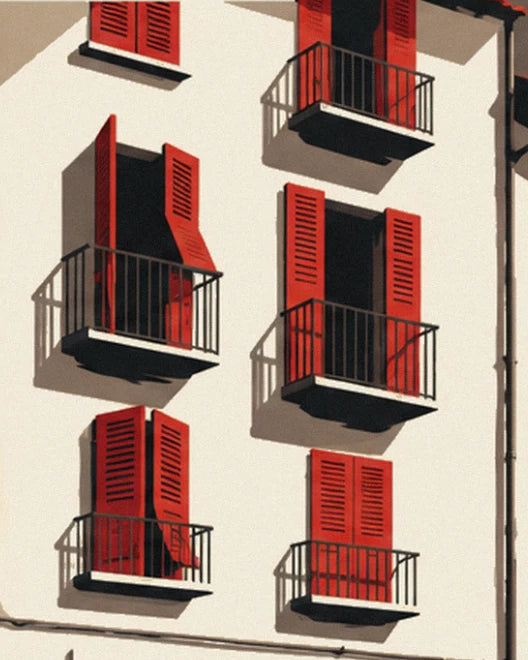 The 3 wrought-iron balconies and their red shutters on the sunlit white façade