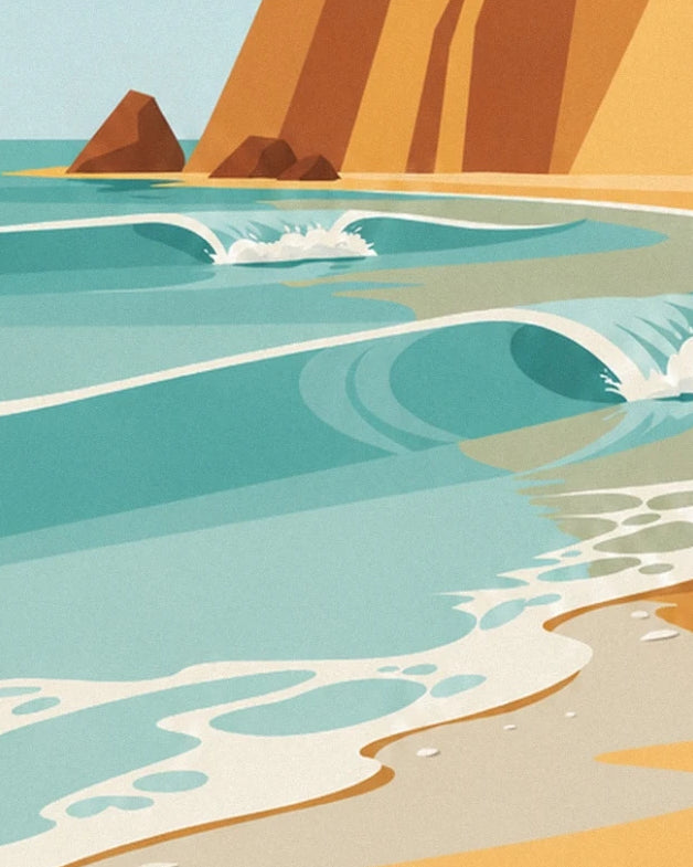 The turquoise waves and their white foam on the sand at the foot of the cliffs