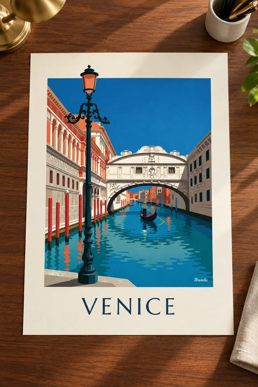 Gondola under the Bridge of Sighs in Venice poster: laid flat on a table