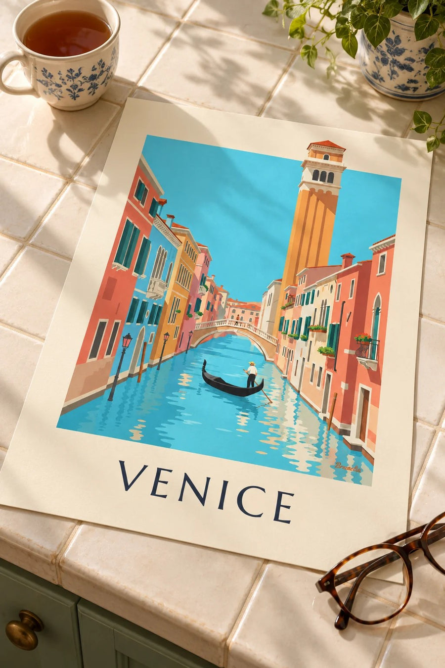 Gondolier on a Venice canal poster: laid flat on a table
