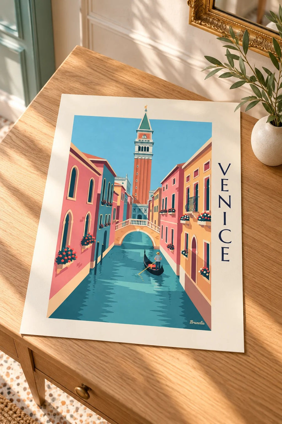 Gondolier on a small canal under the Venice Campanile poster: placed on a table
