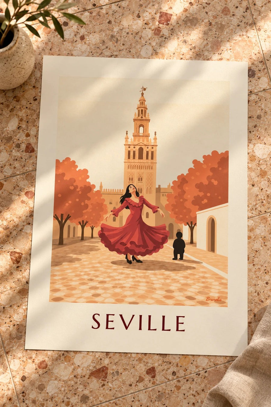 Flamenco dancer before the Giralda in Seville poster: resting on a table