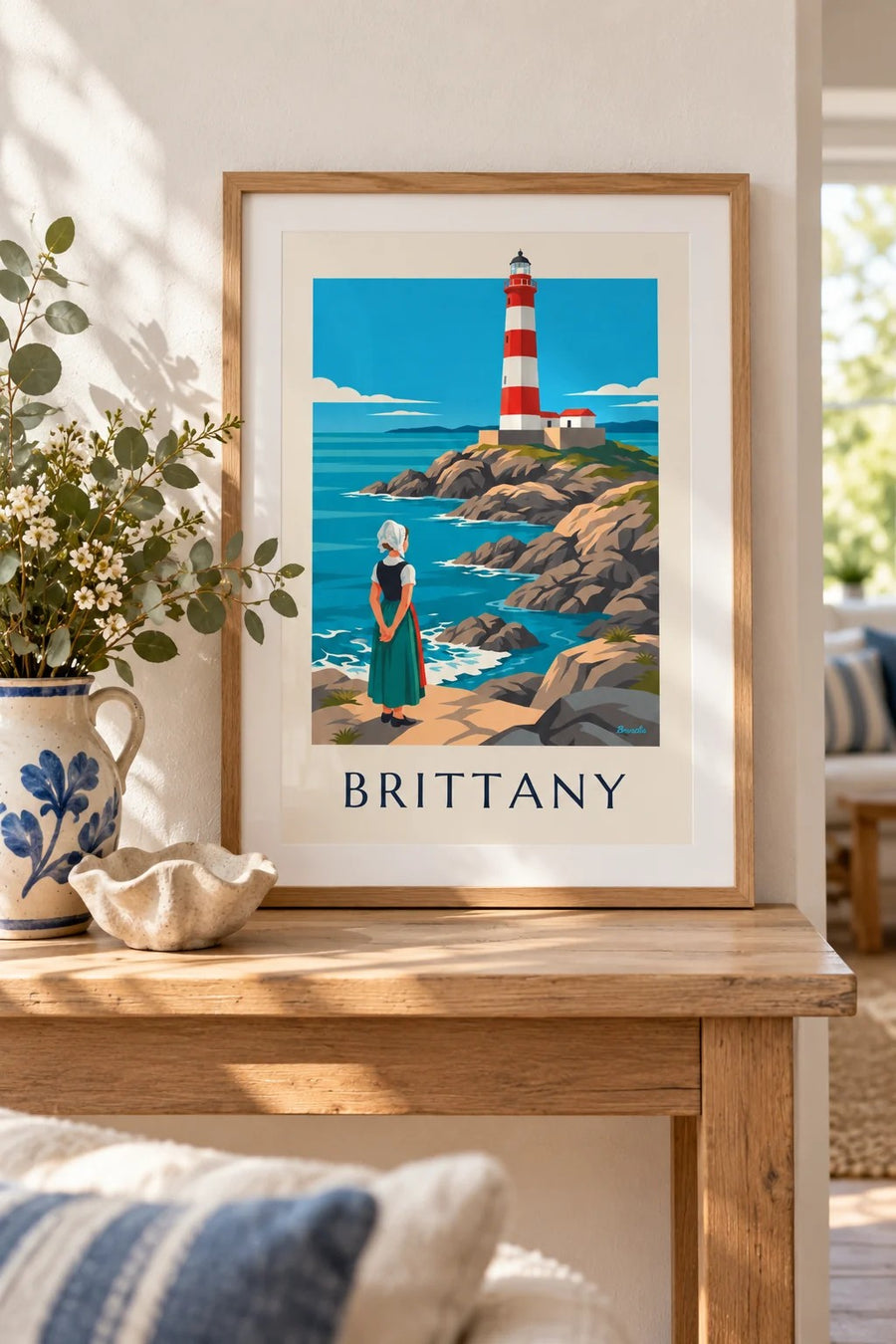 Breton woman in lace headdress and red and white lighthouse poster: small A4 size, framed