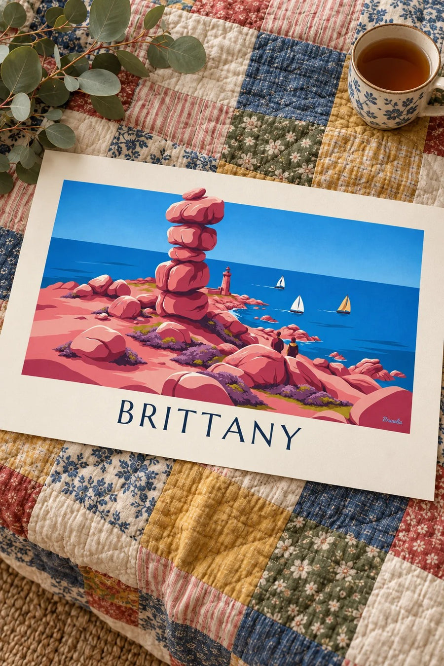 Brittany pink granite coast, lighthouse and sailboats poster: standing on a table