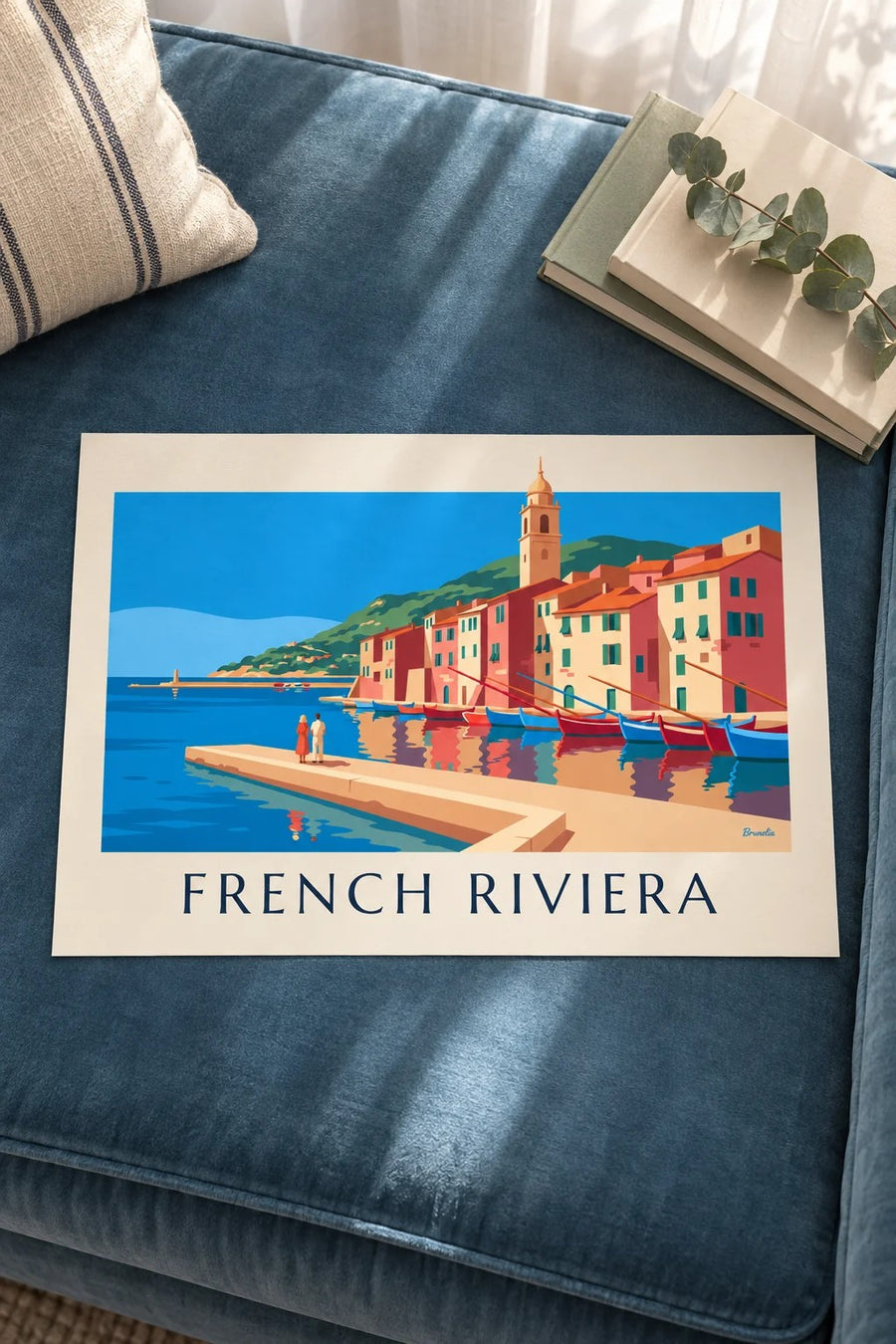 French Riviera harbor with colorful facades and boats poster: standing on a table