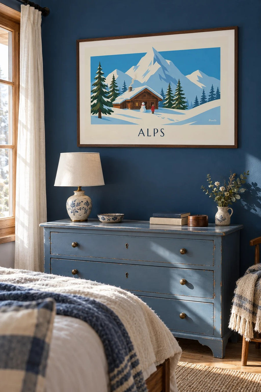 Snowy Alpine chalet and snowman poster: framed on the wall