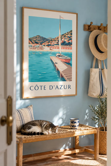 Poster of striped beach huts and a pier on the French Riviera: framed on the wall