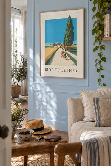Poster of a couple on a tandem bike on a country road: framed on the wall