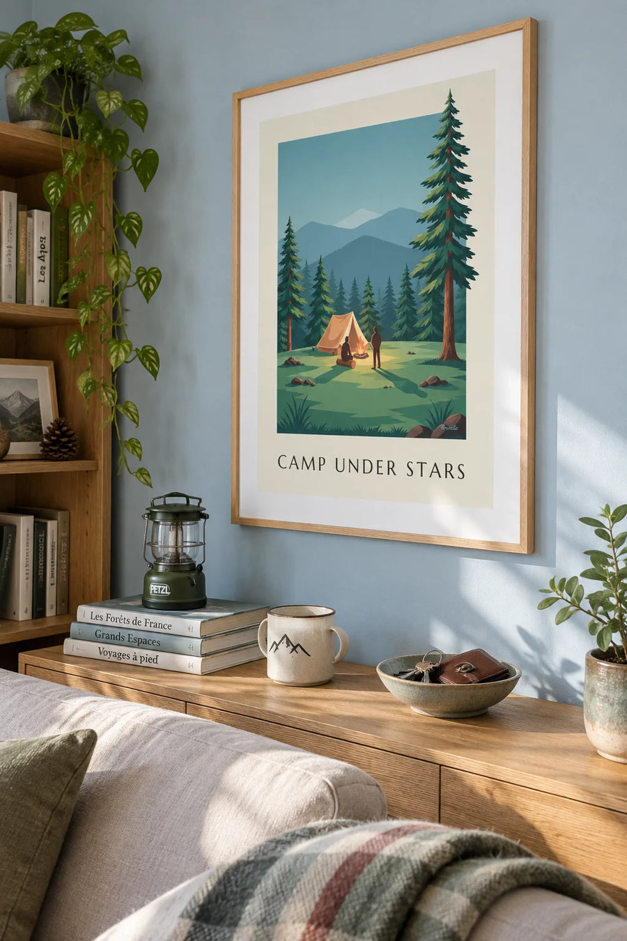 Poster of a tent and campfire in the forest at the foot of the mountains: framed on the wall
