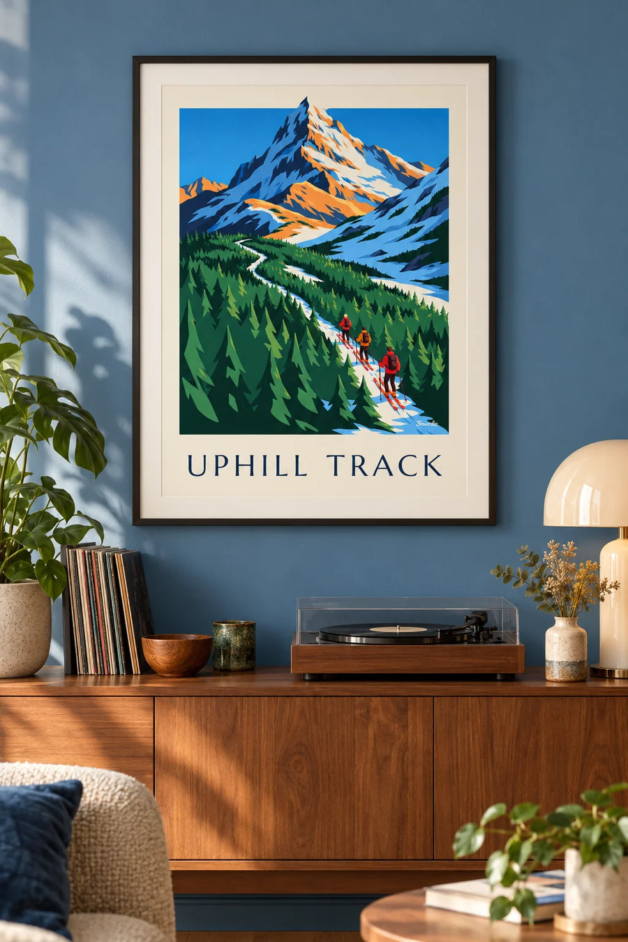 3 ski tourers climbing through fir trees poster : framed on the wall