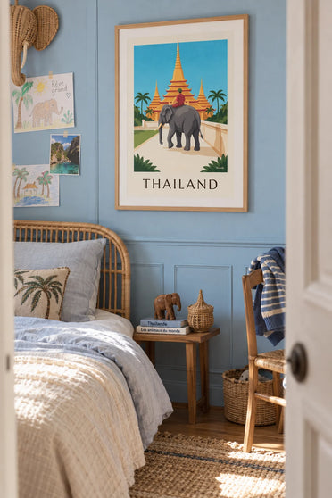 Poster of an elephant and golden pagodas in Thailand: framed on the wall